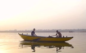 Boat Being Rowed Down River Ganges - Fun - VIDEOTIME.COM
