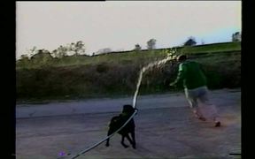 Dog Sprays Down Owner With Hose