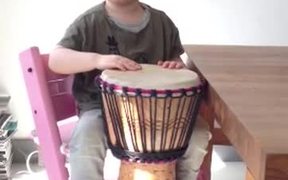 Kid Plays The Djembe