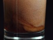 Pouring Cola in Macro View - Slow Motion
