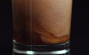 Pouring Cola in Macro View - Slow Motion - Commercials - VIDEOTIME.COM