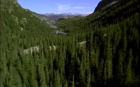Flying over Mountain Lakes and Woodlands