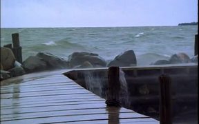 Waves Splashing Wooden Pier - Fun - VIDEOTIME.COM