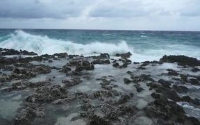 A Choppy Sea Crashing Onto Rocks - Fun - VIDEOTIME.COM