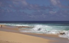 Medium Zoom Shot of Waves Crashing on Beach - Fun - VIDEOTIME.COM