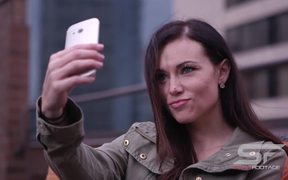 Woman Taking Picture of Herself with Smartphone - Commercials - VIDEOTIME.COM