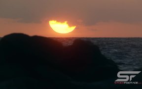 Slow Motion Shot of Sun Setting Over the Ocean