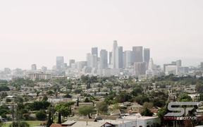 Panning View of Los Angeles with a Smoggy Sky - Fun - VIDEOTIME.COM