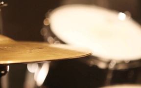 A Drum Plate Playing the Rhythm of the Music