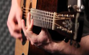 Acoustic Guitar Player in Studio Close Up - Music - VIDEOTIME.COM