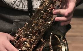 Musician Plays A Gold Saxophone Close Up - Tech - VIDEOTIME.COM