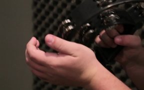 Musician Plays a Tambourine Close Up - Tech - VIDEOTIME.COM