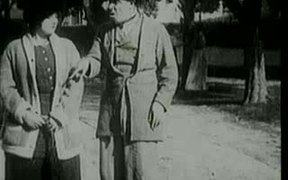 Charlie Chaplin's "Between Showers" - Movie trailer - VIDEOTIME.COM