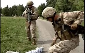Marines Use Non-lethal Force During Demonstration