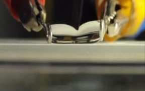 Knife Cutting Water Droplet in Half - Tech - VIDEOTIME.COM