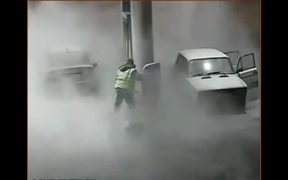 Driver Uses A Match To Look Into The Gas Tank