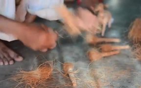 Artisan Making a Coir Toy