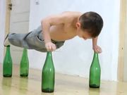 World's Strongest Kid Does Push-Ups On Bottles - Sports - Y8.COM